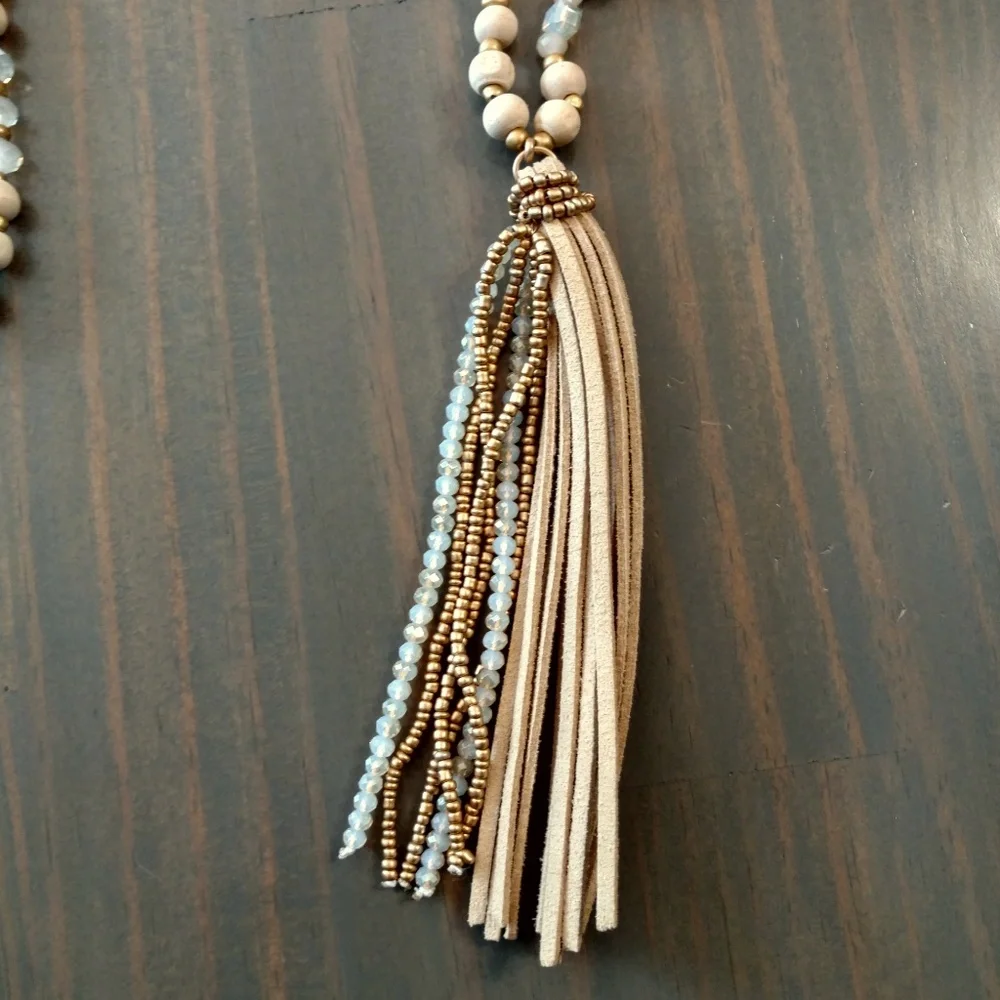 Wood, bead, crystal, and suede tassel necklace